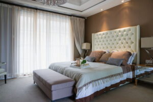 comfortable bedroom with nice carpeting and decor